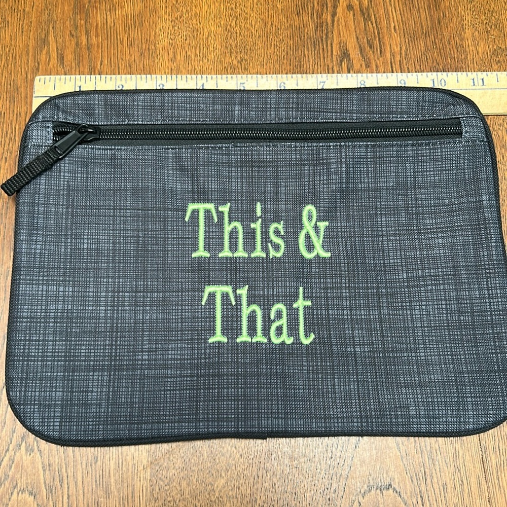 NWOT Thirty-One cosmetic or organizer case, whatever! 8 x 11”. Snap attach back.